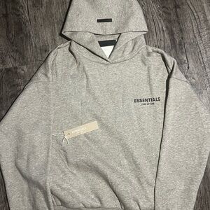 Essentials Light Gray Pullover Hoodie with Minimal Chest Logo